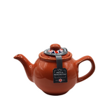 When it's time for a spot of tea, reach for one of our stoneware teapots, which can absorb the heat of boiling water without cracking. Likewise, the beautiful exterior is protected with a gloss to prevent the paint from warping or rippling. The classic bulbous shape allows tea leaves or bags to move freely for just the right amount of flavoring.&nbsp;

The burnt orange teapot is available in 2-cup or 6-cup size