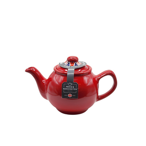 When it's time for a spot of tea, reach for one of our stoneware teapots, which can absorb the heat of boiling water without cracking. Likewise, the beautiful exterior is protected with a gloss to prevent the paint from warping or rippling. The classic bulbous shape allows tea leaves or bags to move freely for just the right amount of flavoring.&nbsp;

Bright red&nbsp;teapot is available in 2-cup or 6-cup size