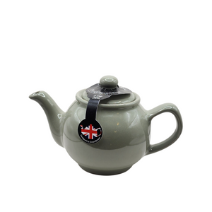 When it's time for a spot of tea, reach for one of our stoneware teapots, which can absorb the heat of boiling water without cracking. Likewise, the beautiful exterior is protected with a gloss to prevent the paint from warping or rippling. The classic bulbous shape allows tea leaves or bags to move freely for just the right amount of flavoring.&nbsp;

Our Sage Green teapot is available in 2-cup or 6-cup size