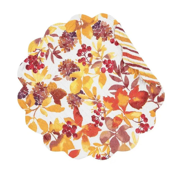  the Cordelia placemat. It features a beautiful leaf and berry design that reverses to a coordinating striped pattern for additional styling options. This cotton placemat will surely be the highlight of your home decor this season, perfect for adding a touch of warmth to any autumn-themed table setting.  Finished with a scalloped edge, this tabletop collection is crafted of 100% cotton and hand-guided machine quilting.  Machine wash cold and tumble dry low for easy care.  17