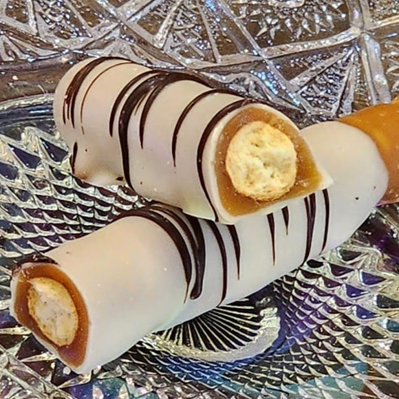 These scrumptious pretzel rods get a generous dip in Sea Salt caramel and are covered in white chocolate and striped all around the pretzel with dark chocolate!  Approximately 7.5