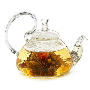 This Bahar glass teapot is perfect for infusing blooming teas! It has a small stainless steel strainer inside the spout that can be removed to clean. Made with high-quality, lead-free borosilicate glass, this teapot is strong, sturdy, and high-temperature resistant.&nbsp; &nbsp;   Content 27.1 fl. oz.  Hand-washing is recommended to preserve its durability    8.5" W x 5.75" d x 5.25" H