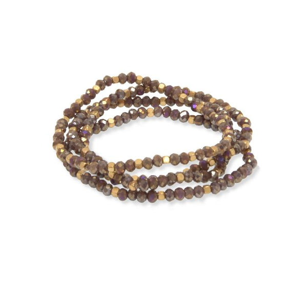 Mix these four mauve and gold beaded stretch bracelets in with other bracelets of yours, or alone for some added sparkle to you outfit!
