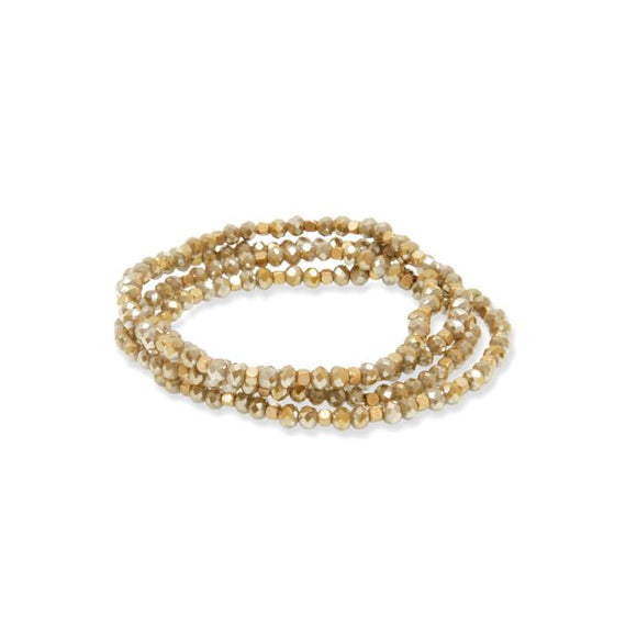 Mix these four natural and gold beaded stretch bracelets in with other bracelets of yours, or alone for some added sparkle to you outfit!