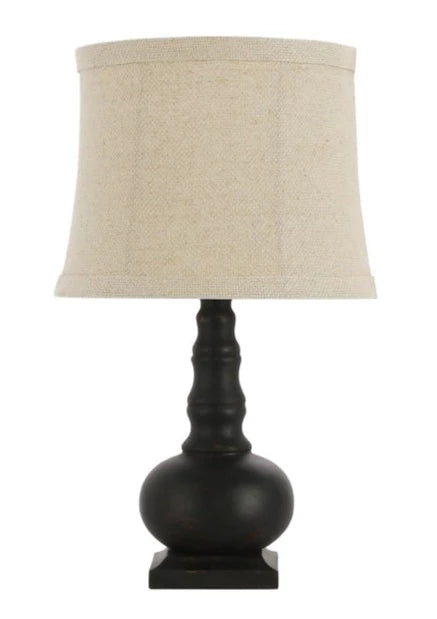 This striking accent lamp features a slightly weathered black finish. A classic look for any room in the house. This little lamp adds the perfect touch to a powder room bedroom, living room, bookcase, or small accent table. Use it as a night light or accent light.   25-watt bulb not included.  15