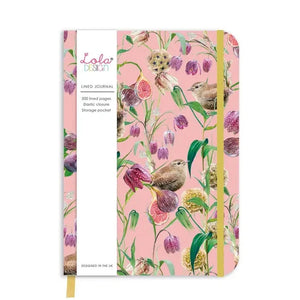 A beautiful journal to write your thoughts in! It is a beautiful shade of pink with purple figs and flowers, white flowers on the front, and a wren sitting among them all.&nbsp; A gold elastic helps keep it closed when you're not writing. It also has a gold ribbon bookmark attached to help you keep track of where you are at!