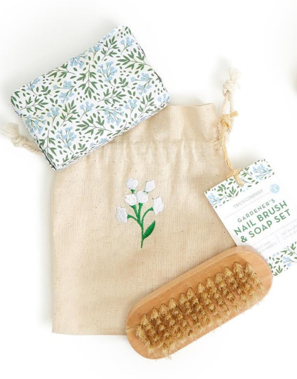 How adorable is this gardener's care kit? Includes a nail brush and garden-scented soap to clean off all that dirt and soil from a hard day's work of gardening. The set comes packed in an adorable cotton canvas drawstring bag with a cute embroidered white flower on the font. The perfect gift for all garden lovers!  Brush: 3 3/4