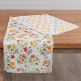 You'll love this beautiful table runner, it's a perfect piece to bring in some instant sunshine!  We love the pink and yellow flowers scattered in with white daisies and bumble bees - so very happy!  Cotton  55" L x 14"W