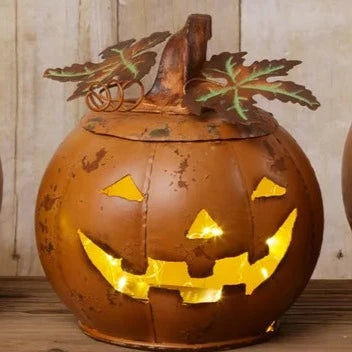 We love this small rustic orange distressed pumpkin! Its lid has copper color leaves, and a stem fits right on top. Use it to put your candy in for your trick-or-treaters, or stick a LED candle in it for some Halloween ambiance!  8.5