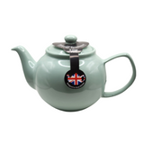 When it's time for a spot of tea, reach for one of our stoneware teapots, which can absorb the heat of boiling water without cracking. Likewise, the beautiful exterior is protected with a gloss to prevent the paint from warping or rippling. The classic bulbous shape allows tea leaves or bags to move freely for just the right amount of flavoring.&nbsp;

Our mint&nbsp;teapot is available in 2-cup or 6-cup size