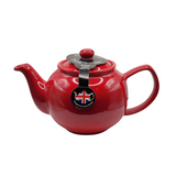 When it's time for a spot of tea, reach for one of our stoneware teapots, which can absorb the heat of boiling water without cracking. Likewise, the beautiful exterior is protected with a gloss to prevent the paint from warping or rippling. The classic bulbous shape allows tea leaves or bags to move freely for just the right amount of flavoring.&nbsp;

Bright red&nbsp;teapot is available in 2-cup or 6-cup size