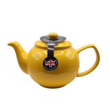 When it's time for a spot of tea, reach for one of our stoneware teapots, which can absorb the heat of boiling water without cracking. Likewise, the beautiful exterior is protected with a gloss to prevent the paint from warping or rippling. The classic bulbous shape allows tea leaves or bags to move freely for just the right amount of flavoring.&nbsp;

Sunshine yellow teapot is available in 2-cup or 6-cup size