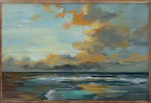 Here is the perfect "WOW" piece for your room! In colors of blues, yellows, and oranges, the "Oceanside Sunset" artwork by Silvia Vassileva will take your breath away!   Made in the USA  36" x 24" x 1.5"  *This Artwork is oversized and will need to be picked up at the Helena, OH, location.