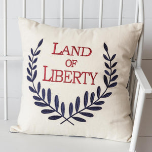 <p>Get your patriotic on with our embroidered "Land of Liberty" pillow.&nbsp; It is off-white with a navy laurel leaf on the right and left side with the words "Land of Liberty" in red. We especially love that the back of the pillow has a navy background with stars scattered all around the fabric.</p> <p><span>16 H x 16 W x 4 D</span></p> <p><span>Cotton, Polyester Fiber</span></p>