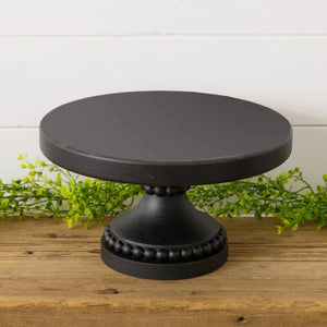 If you've been in the store, you know that we LOVE our risers & cake plates ~ They make such a difference when decorating and give you so many possibilities!  This black one has two bead rings around the base and then the center.    6.25" H x 11.25" Dia