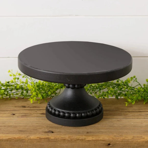 If you've been in the store, you know that we LOVE our risers & cake plates ~ They make such a difference when decorating and give you so many possibilities!  This black one has two bead rings around the base and then the center.    6.25