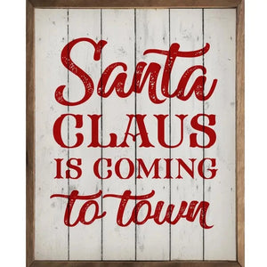 'Tis the season! "Santa Claus is coming to town" is written in mixed white fonts in red on a whitewashed background with a wooden all around.  It is made from high-quality American hardwood planks with a hand-painted face, printed with UV-cured ink, and is framed in a natural walnut frame. Each piece is unique with its own personality, marks, wood grain, and look. Easy to clean with a dry cloth.Made in the USA  8" w x 10" h x 1.5 d
