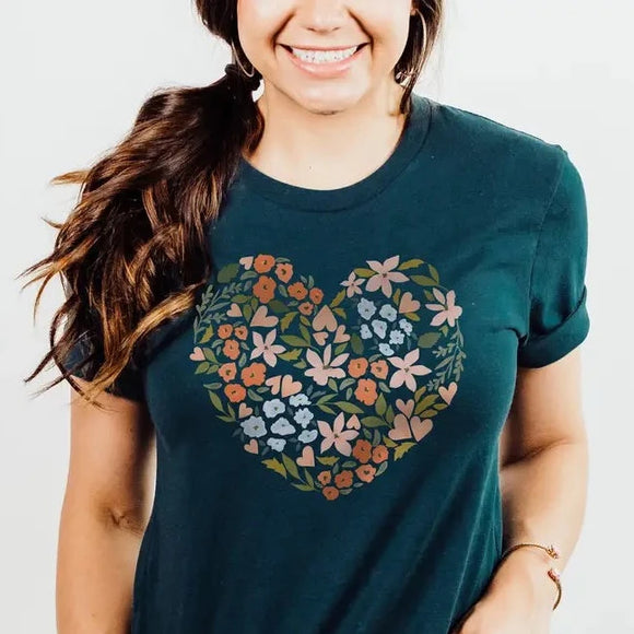 We love this dark teal tee with a pretty peach and blue floral heart design! Printed direct-to-fabric printing for a soft design that won't crack or peel. The shirts are soft Bella and Canvas unisex fashion-fit tees that fit like a well-loved favorite, featuring a crew neck and short sleeves.