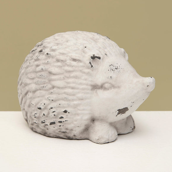 <p>This hedgehog has a distressed white finish and is made of concrete and is too cute! He can be put inside or outside.<span></span></p> <p>Approximately 6