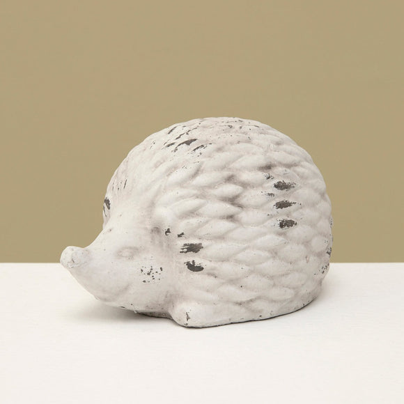 <p>This small hedgehog has a distressed white finish, is made of concrete, and is too cute! He can be put inside or outside.<span></span></p> <p>Approximately 5