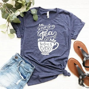A cup of tea solves EVERYTHING....of course, if you're a tea drinker, you already know this! This heathered blue tee has a teacup and the words "A cup of tea solves everything" in a mixed white font. The shirts are soft Bella and Canvas unisex fashion-fit tees that fit like a well-loved favorite, featuring a crew neck and short sleeves.

100% Airlume combed and ring-spun cotton.

Made in the United States