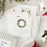 Twenty-five small cards, twenty-five days of waiting well. This set gives you one verse a day with a Christmas illustration, from December 1st to Christmas, something quietly constant to return to while everything else picks up speed. The cards come in a keepsake box, so the set works as a gift on its own. Keep the stack of cards in a stand on the counter, tuck one into a card for a friend, or use them as bookmarks along the way.

Details: - set of 25 cards - 4" x 4" - comes in a keepsake box - stands sold 