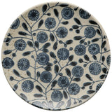Elevate your next get-together with a Calendula appetizer plate from the Element collection. A pretty blue calendula flower pattern is scattered all over the putty colored plate.&nbsp;

The nature and beauty of reactive glaze is that each piece is unique. There may be slight variations in color, texture, and finish to each perfectly imperfect item.

6.5" Dia

Material: Stoneware with a reactive glaze. Care instructions: Microwave and dishwasher safe.&nbsp;