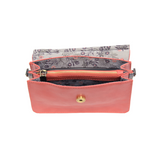 Put a ring on it! Perfect for your next night out, this cute coral bracelet bag looks great with your fav jeans or slinky dress! With multiple compartments, it is just the right size to hold all your essentials. Wear it on your wrist with the metallic ring bracelet, or carry as a clutch, or wear as a crossbody with the detachable shoulder strap.


Dimensions: 6 in. H x 8.25 in. W x 3.5 in. at deepest point
Tapers up to the top point
Adjustable and removable crossbody strap: 20-25 in.
3 in. diameter ring tha