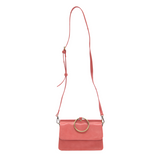 Put a ring on it! Perfect for your next night out, this cute coral bracelet bag looks great with your fav jeans or slinky dress! With multiple compartments, it is just the right size to hold all your essentials. Wear it on your wrist with the metallic ring bracelet, or carry as a clutch, or wear as a crossbody with the detachable shoulder strap.


Dimensions: 6 in. H x 8.25 in. W x 3.5 in. at deepest point
Tapers up to the top point
Adjustable and removable crossbody strap: 20-25 in.
3 in. diameter ring tha