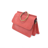 Put a ring on it! Perfect for your next night out, this cute coral bracelet bag looks great with your fav jeans or slinky dress! With multiple compartments, it is just the right size to hold all your essentials. Wear it on your wrist with the metallic ring bracelet, or carry as a clutch, or wear as a crossbody with the detachable shoulder strap.


Dimensions: 6 in. H x 8.25 in. W x 3.5 in. at deepest point
Tapers up to the top point
Adjustable and removable crossbody strap: 20-25 in.
3 in. diameter ring tha