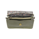 Put a ring on it! Perfect for your next night out, this cute eucalyptus bracelet bag looks great with your fav jeans or slinky dress! With multiple compartments, it is just the right size to hold all your essentials. Wear it on your wrist with the metallic ring bracelet, or carry as a clutch, or wear as a crossbody with the detachable shoulder strap.


Dimensions: 6 in. H x 8.25 in. W x 3.5 in. at deepest point
Tapers up to the top point
Adjustable and removable crossbody strap: 20-25 in.
3 in. diameter rin