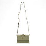 Put a ring on it! Perfect for your next night out, this cute eucalyptus bracelet bag looks great with your fav jeans or slinky dress! With multiple compartments, it is just the right size to hold all your essentials. Wear it on your wrist with the metallic ring bracelet, or carry as a clutch, or wear as a crossbody with the detachable shoulder strap.


Dimensions: 6 in. H x 8.25 in. W x 3.5 in. at deepest point
Tapers up to the top point
Adjustable and removable crossbody strap: 20-25 in.
3 in. diameter rin