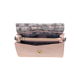 Put a ring on it! Perfect for your next night out, this cute soft pink bracelet bag looks great with your fav jeans or slinky dress! With multiple compartments, it is just the right size to hold all your essentials. Wear it on your wrist with the metallic ring bracelet, or carry as a clutch, or wear as a crossbody with the detachable shoulder strap.


Dimensions: 6 in. H x 8.25 in. W x 3.5 in. at deepest point
Tapers up to the top point
Adjustable and removable crossbody strap: 20-25 in.
3 in. diameter ring