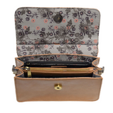 Put a ring on it! Perfect for your next night out, this cute warm tan bracelet bag looks great with your fav jeans or slinky dress! With multiple compartments, it is just the right size to hold all your essentials. Wear it on your wrist with the metallic ring bracelet, or carry as a clutch, or wear as a crossbody with the detachable shoulder strap.


Dimensions: 6 in. H x 8.25 in. W x 3.5 in. at deepest point
Tapers up to the top point
Adjustable and removable crossbody strap: 20-25 in.
3 in. diameter ring 