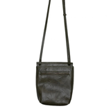 With a slim, streamlined look, this vegan leather crossbody, in a beautiful backwoods green, features a top flap with magnetic snap closure and an adjustable shoulder strap so you can carry it as a crossbody or a shoulder bag. With two convenient slip pockets, one under the flap and one on the back you can keep your phone and keys in easy reach.


Dimensions: 9.5 in. H x 8 in. W x 2.75 in. D
Magnetic snap closure
Adjustable shoulder strap: 14 in. - 27.5 in. drop
Brass plated hardware
100% Vegan leather (pol