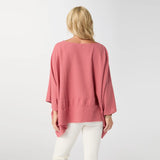 Relaxed and effortlessly chic, the Peyton Frayed Edge Poncho is a versatile layering piece designed for easy, everyday wear. Featuring a soft drape and wide, flowy silhouette in a beauitful desert clay color, this poncho is finished with subtle frayed edge detailing for a casual, lived‑in feel. Lightweight and comfortable, it layers beautifully over tanks or tees and pairs effortlessly with denim for a polished yet laid‑back look.

Materials: Cotton.

One size fits most.