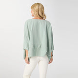 Relaxed and effortlessly chic, the Peyton Frayed Edge Poncho is a versatile layering piece designed for easy, everyday wear. Featuring a soft drape and wide, flowy silhouette in a beauitful sea glass color, this poncho is finished with subtle frayed edge detailing for a casual, lived‑in feel. Lightweight and comfortable, it layers beautifully over tanks or tees and pairs effortlessly with denim for a polished yet laid‑back look.

Materials: Cotton.

One size fits most.