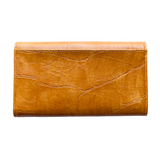 Our best-selling wallet has been updated this season in gorgeous, cruelty-free, embossed crocodile golden tan vegan leather in rich colors that coordinate perfectly with our collection of Croco bags. The Marnie wallet is a small sleek size but with all the functions of a full-size wallet. Featuring multiple credit card slots, billfold pockets and even a zipper coin pocket this wallet has space for everything you need in a slim, compact size. Perfect if you need that smaller wallet for your mini bag!
Product