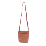 With a slim, streamlined look, this vegan leather crossbody in a beautiful clay pink color features a top flap with magnetic snap closure and an adjustable shoulder strap so you can carry it as a crossbody or a shoulder bag. With two convenient slip pockets, one under the flap and one on the back you can keep your phone and keys in easy reach.


Dimensions: 9.5 in. H x 8 in. W x 2.75 in. D
Magnetic snap closure
Adjustable shoulder strap: 14 in. - 27.5 in. drop
Brass plated hardware
100% Vegan leather (polyu