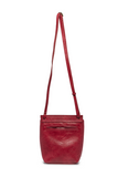 With a slim, streamlined look, this vegan leather crossbody, in a beautiful cranberry color, features a top flap with magnetic snap closure and an adjustable shoulder strap so you can carry it as a crossbody or a shoulder bag. With two convenient slip pockets, one under the flap and one on the back you can keep your phone and keys in easy reach.


Dimensions: 9.5 in. H x 8 in. W x 2.75 in. D
Magnetic snap closure
Adjustable shoulder strap: 14 in. - 27.5 in. drop
Brass plated hardware
100% Vegan leather (pol
