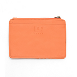 We love this mini wallet in a happy coral peach colored vegan leather! It is full of style and will hold your license and up to six credit cards. The zipper pocket is roomy enough for your change and cash, and a pocket is on the back.&nbsp; This mini wallet is perfect for you, but it makes an awesome gift!

DIMENSIONS: 4 IN. H X 5.5 IN. W X .25 IN. D

ZIPPERED TOP CLOSURE ON EDGE

6 CREDIT CARD POCKETS

ID WINDOW POCKET

EXTERIOR PASSPORT POCKET

STRIPED LINING

BRASS PLATED HARDWARE

100% VEGAN LEATHER (PO
