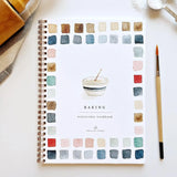 Twelve baking illustrations — a cupcake, layer cake, mixing bowl, lattice pie, tray of cookies, rolling pin with cookie cutters, and more — each pre-outlined with step-by-step instructions. Paintings take about thirty minutes from start to finish, making it approachable for first-time painters and a favorite for gifting.

Details: - 12 beginner-friendly illustrations

Thick 120lb watercolor paper

&nbsp;Lay-flat pages with spiral binding for hassle-free painting and easy tear-out

Lightly outlined sketches 