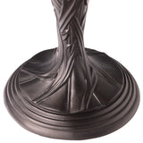 Add Celtic charm to your home with this beautiful 21.5-Inch Celtic Blooming Flower Stained Glass Table Lamp! This exquisite accent fixture masterfully pairs a slender candlestick frame with heritage glasswork to bring a warm presence to your home. The stunning dome shade showcases an intricate blooming flower design that traditionally symbolizes interconnectedness, purity, and renewal. Meticulously crafted using traditional stained glass techniques, it weaves together a vibrant, inviting palette of rich cre
