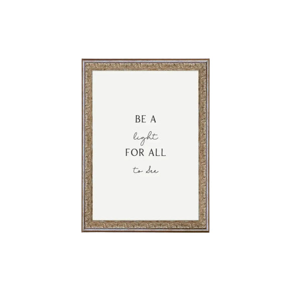 We are obsessed with these framed sayings! This one has a white background with 