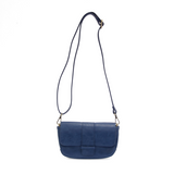 So stylish and chic the Becca baguette bag in celestial blue brings polish to your look. &nbsp;Made in our best-selling vintage vegan leather in of the moment fashion colors, this adorable bag comes with two shoulder straps for versatility, a short strap to carry as a short shoulder or a long adjustable strap to wear as a crossbody bag when you want to be hands free.&nbsp; Even upgrade your look and express your personality by adding one of our coordinating Guitar Straps.


Dimensions: 4.5 in. H x 8 in. W x