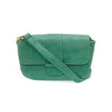 So stylish and chic the Becca baguette bag in true turquoise brings polish to your look. &nbsp;Made in our best-selling vintage vegan leather in of the moment fashion colors, this adorable bag comes with two shoulder straps for versatility, a short strap to carry as a short shoulder or a long adjustable strap to wear as a crossbody bag when you want to be hands free.&nbsp; Even upgrade your look and express your personality by adding one of our coordinating Guitar Straps.


Dimensions: 4.5 in. H x 8 in. W x