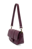 So stylish and chic, the Becca baguette bag in a beautiful mulberry brings polish to your look.&nbsp; Made in our best-selling vintage vegan leather in on-trend fashion colors, this adorable bag comes with two shoulder straps for versatility: a short strap for a short shoulder bag and a long adjustable strap for a hands-free crossbody.&nbsp; Even upgrade your look and express your personality by adding one of our coordinating Guitar Straps.


Dimensions: 4.5 in. H x 8 in. W x 2.25 in.
Removable non-adjustab