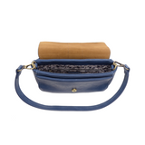 So stylish and chic the Becca baguette bag in celestial blue brings polish to your look. &nbsp;Made in our best-selling vintage vegan leather in of the moment fashion colors, this adorable bag comes with two shoulder straps for versatility, a short strap to carry as a short shoulder or a long adjustable strap to wear as a crossbody bag when you want to be hands free.&nbsp; Even upgrade your look and express your personality by adding one of our coordinating Guitar Straps.


Dimensions: 4.5 in. H x 8 in. W x