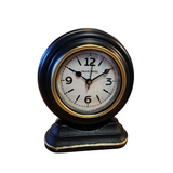 This black and gold table clock is the perfect size for your desk, bookcase, or bathroom to keep you on time!

6" H x 4.75" W x 2.25"D