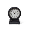This wooden mantel clock is accented by a curved base and scrolled details. The Roman Numerals add to its vintage charm and the black hand-painted finish that will make it standout in your home.

Requires a single AA battery, not included.

7" L x 3" W x 9.5" H